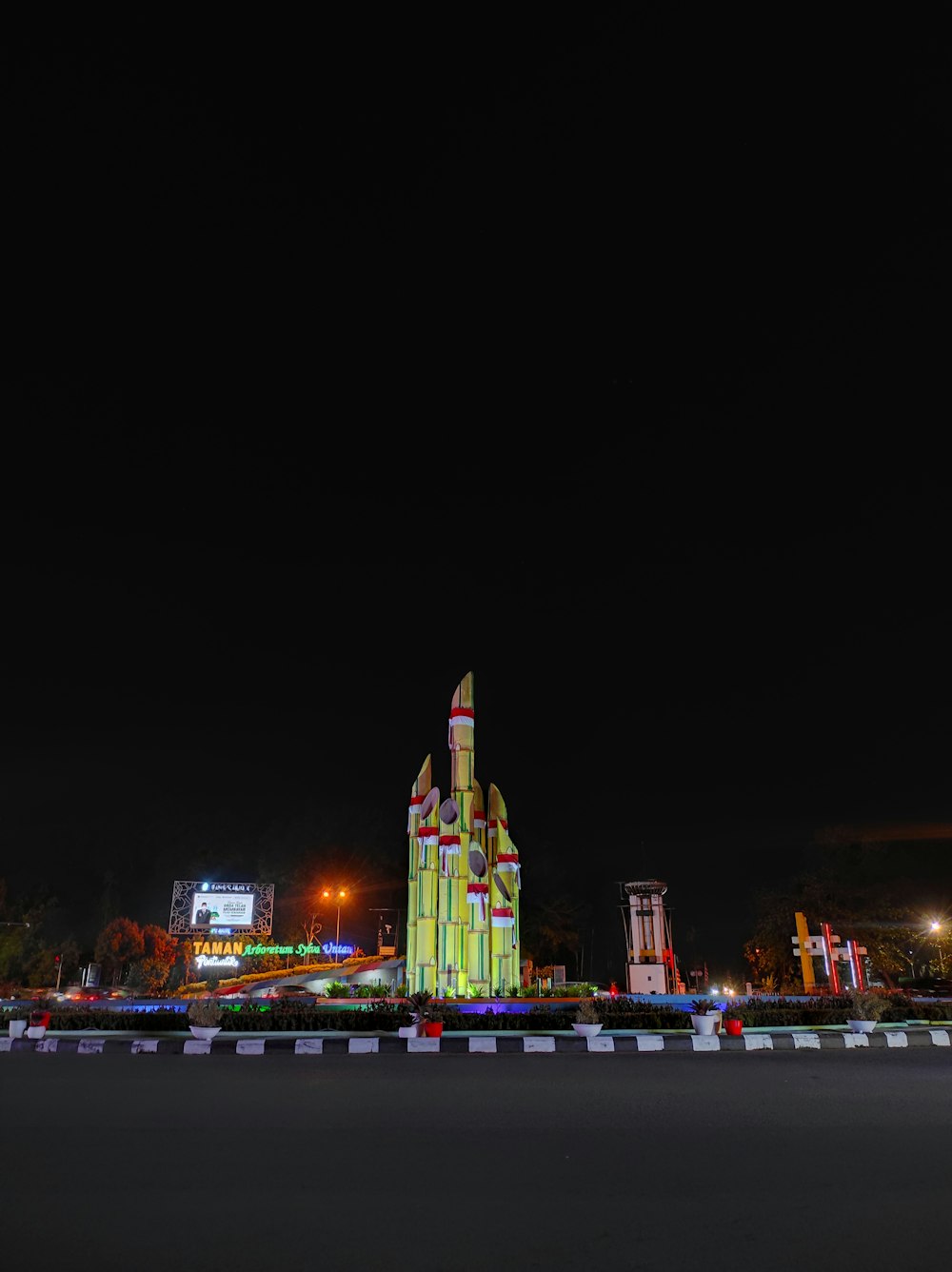 a large colorful tower in a city