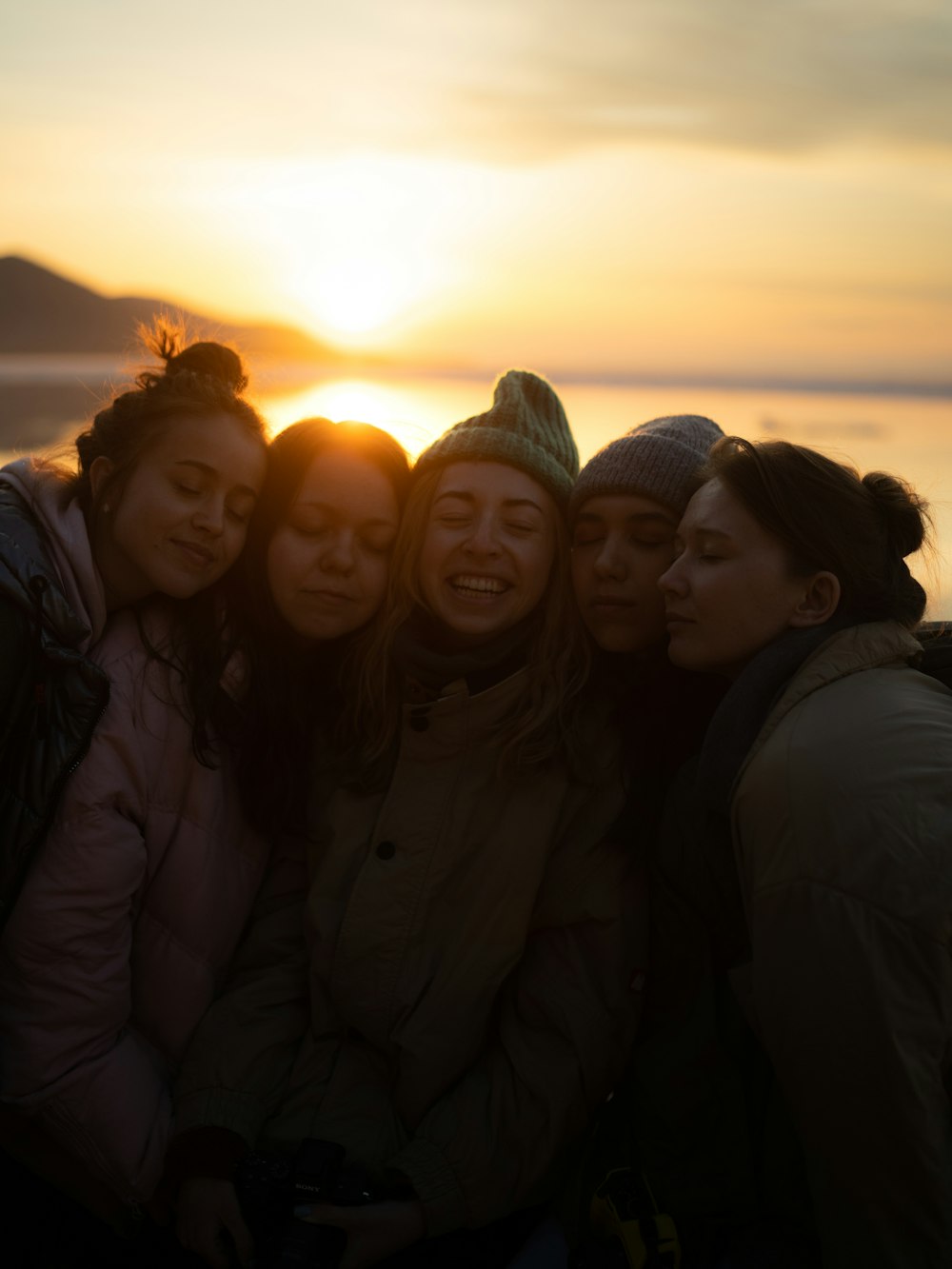 a group of people posing for a photo