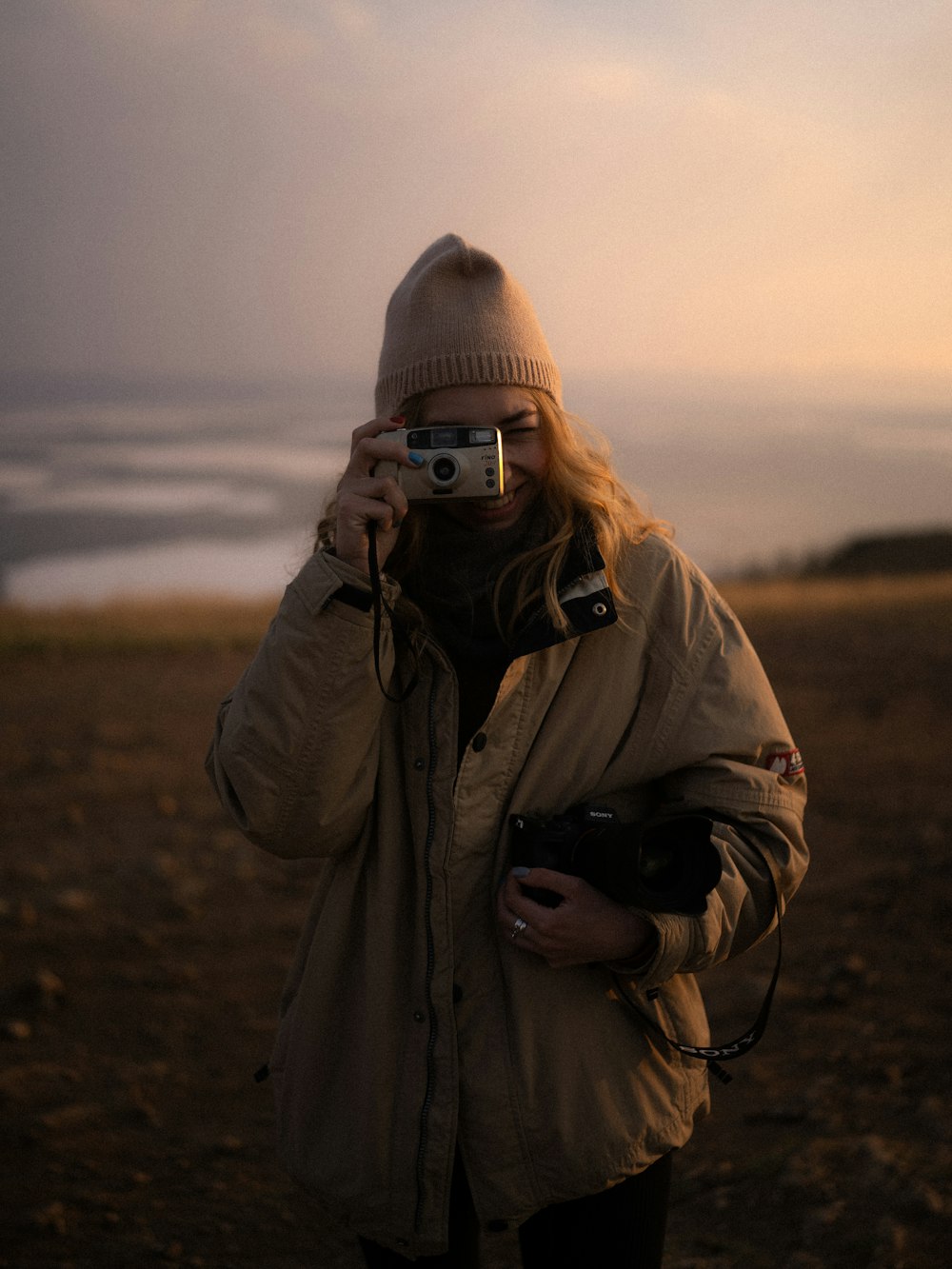 a person holding a camera