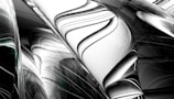 A digital abstract artwork featuring smooth, flowing curves and lines that create a sense of motion and depth. The image predominantly uses shades of black, white, and hints of green, forming a fluid and dynamic composition.