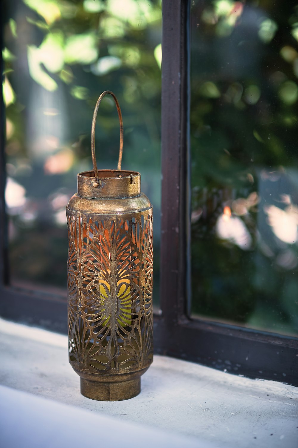 a glass jar with a handle