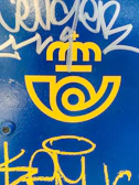 Detail of a blue and gold-themed branding on official stationery.