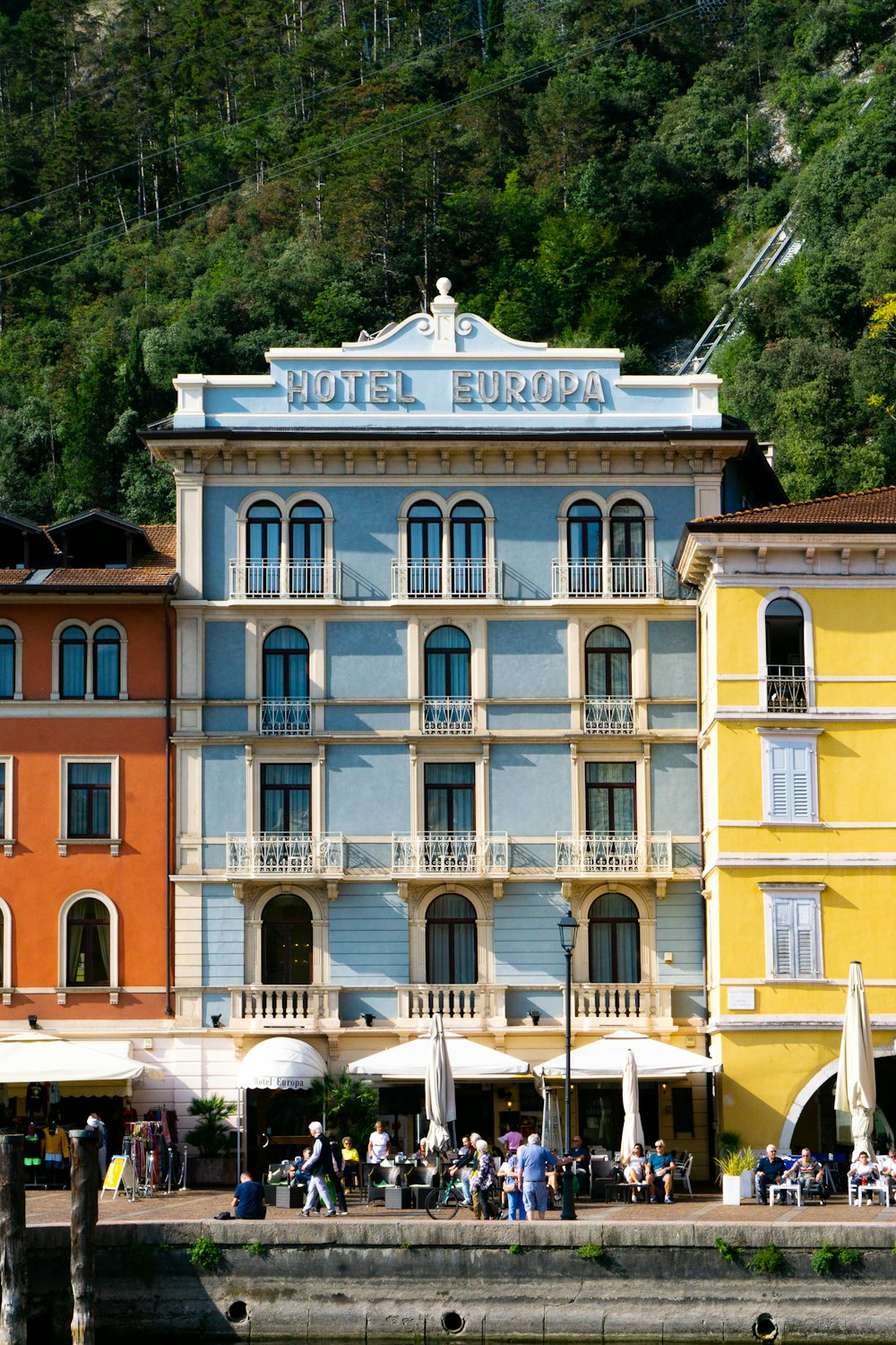 a building with a hill in the background