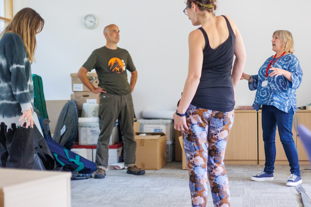 a group of people standing in a room