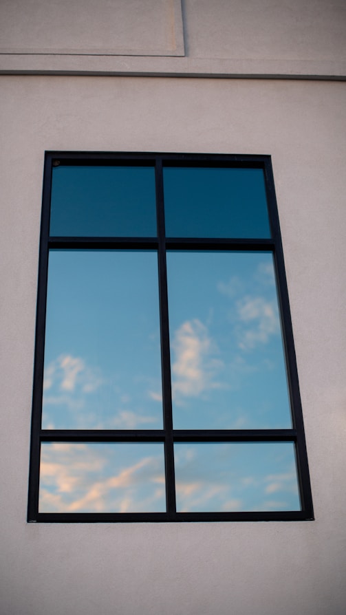 a window with a blue sky