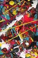 A vibrant abstract painting bursting with bold blues, reds, and yellows, capturing urban energy.