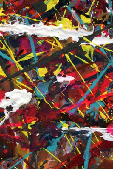 A vibrant canvas bursting with swirling colors and bold brushstrokes, capturing the energy of creative passion.