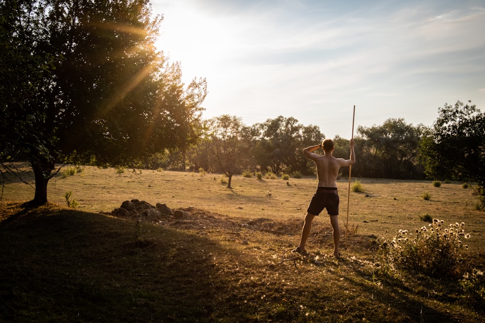 a person holding a stick