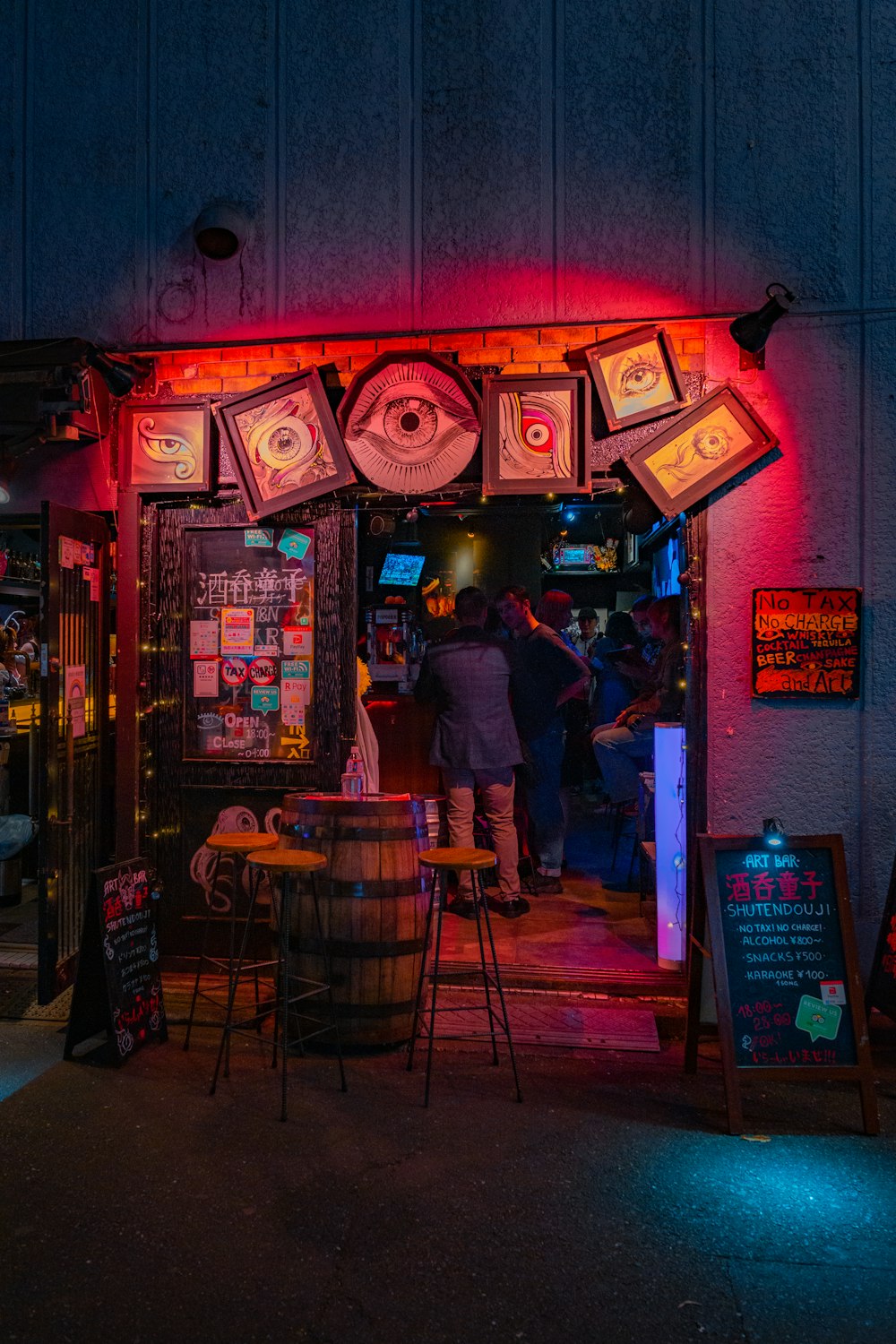 a group of people standing in a bar