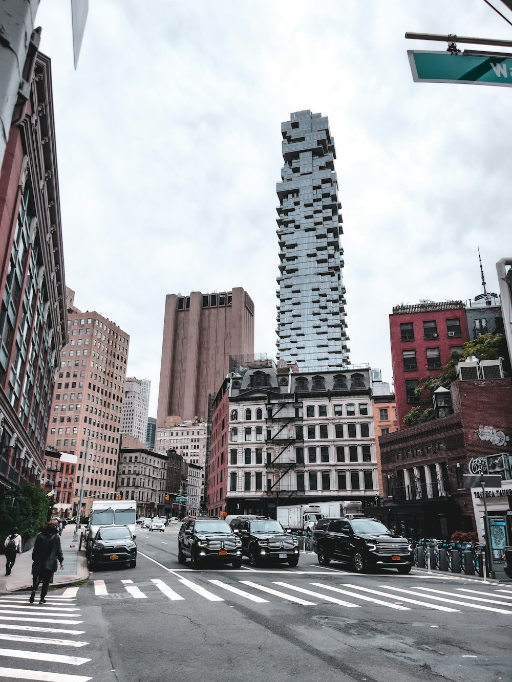 a city street with tall buildings