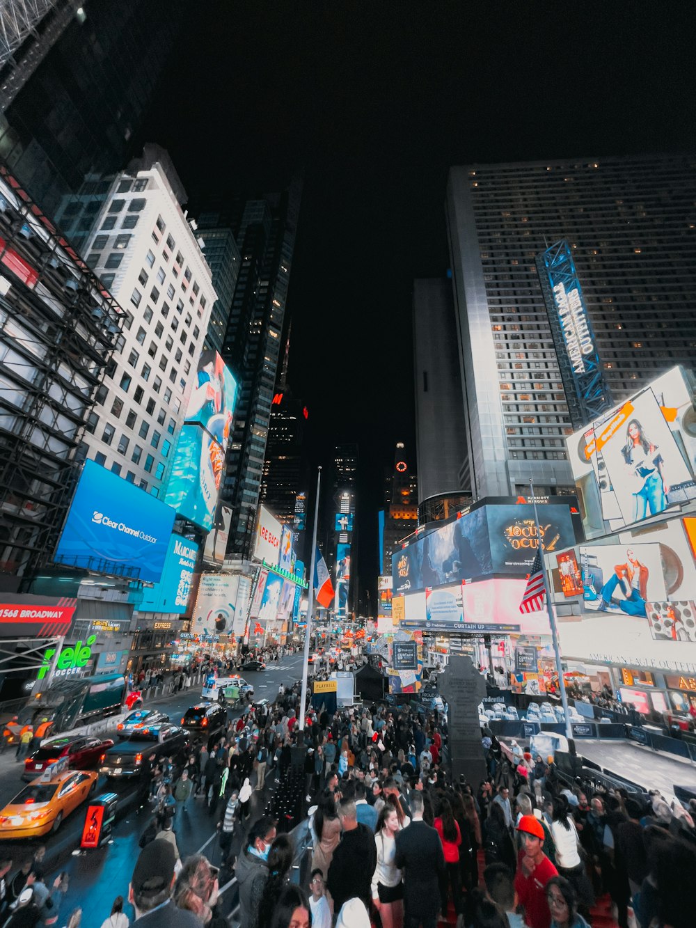 a crowd of people in a city