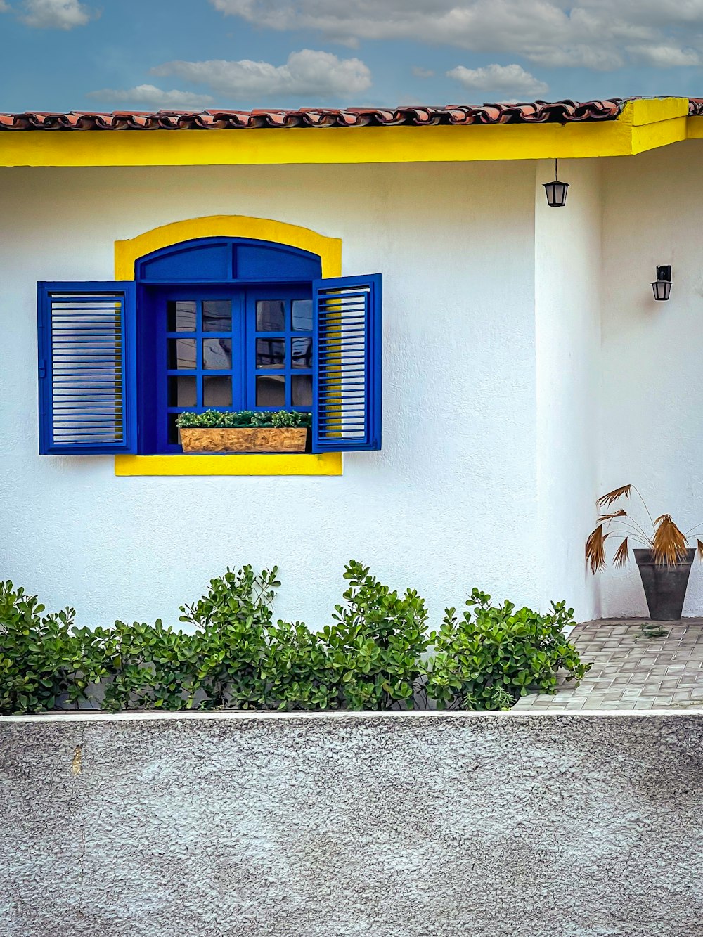 a building with blue shutters