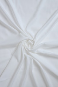 A beautiful display of white georgette fabrics perfect for weddings.