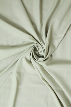 a white cloth with a white line | Konveksi Malang