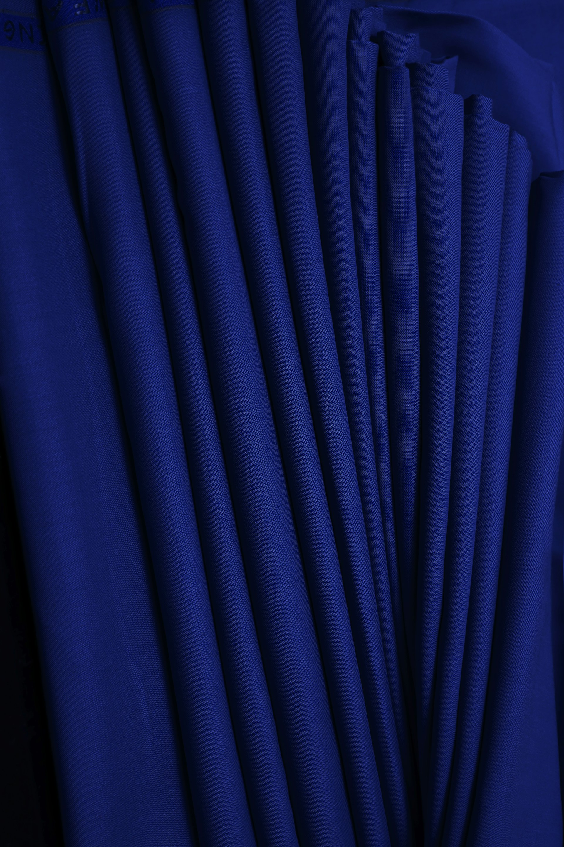 a close up of a blue wall