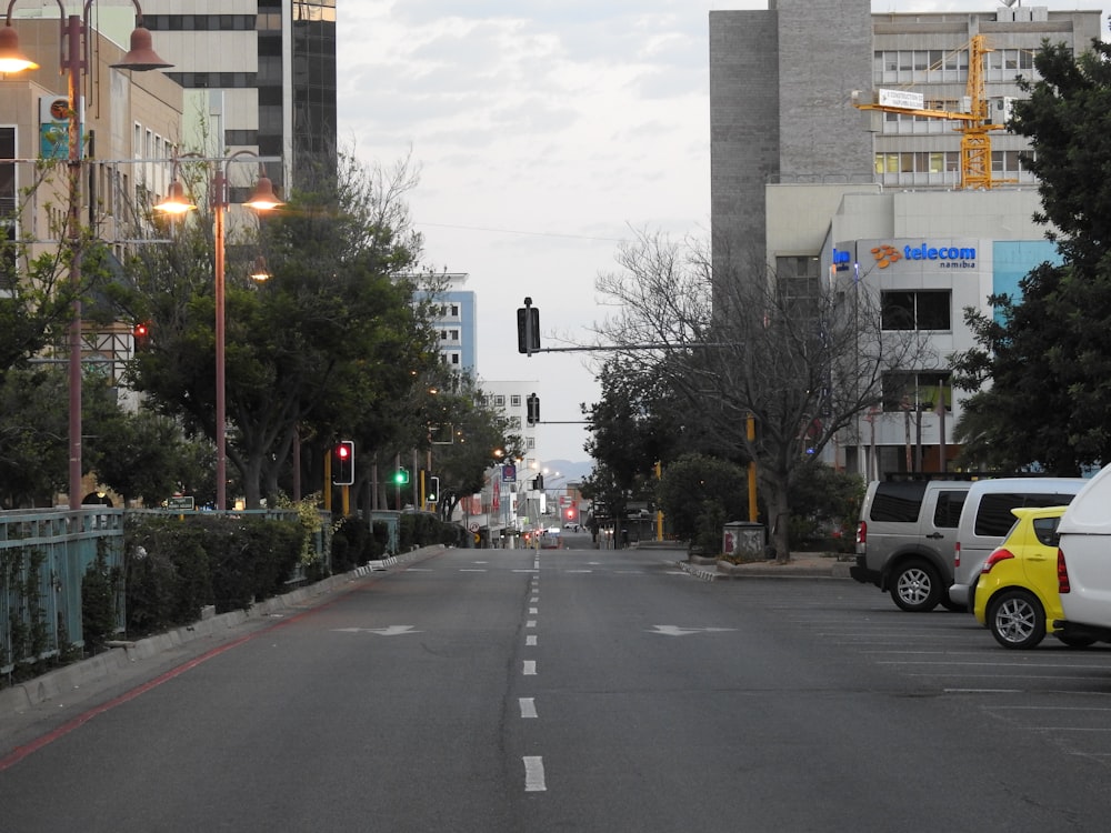 a street with cars and buildings