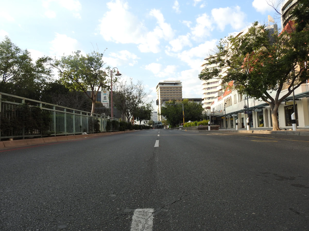 A broad, quiet tree-lined street in central Windhoek