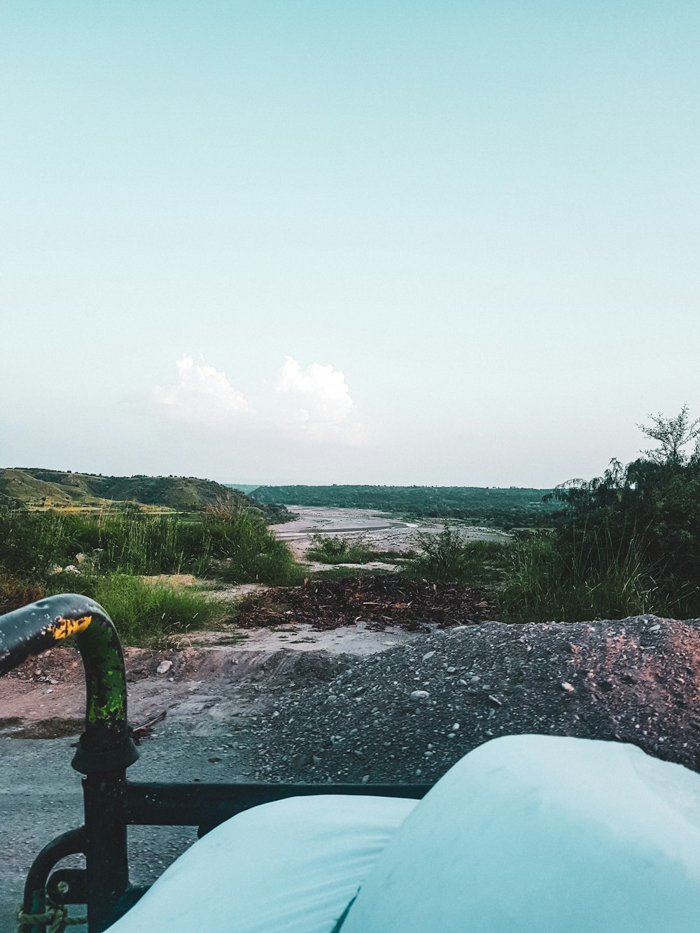 a view of a beach and ocean from a boat