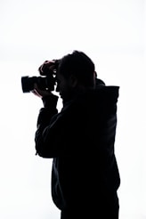 a man holding a camera