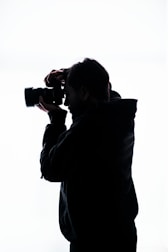 a man holding a camera