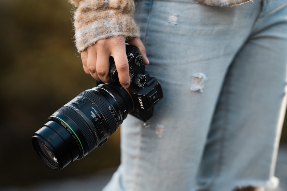 a person holding a camera