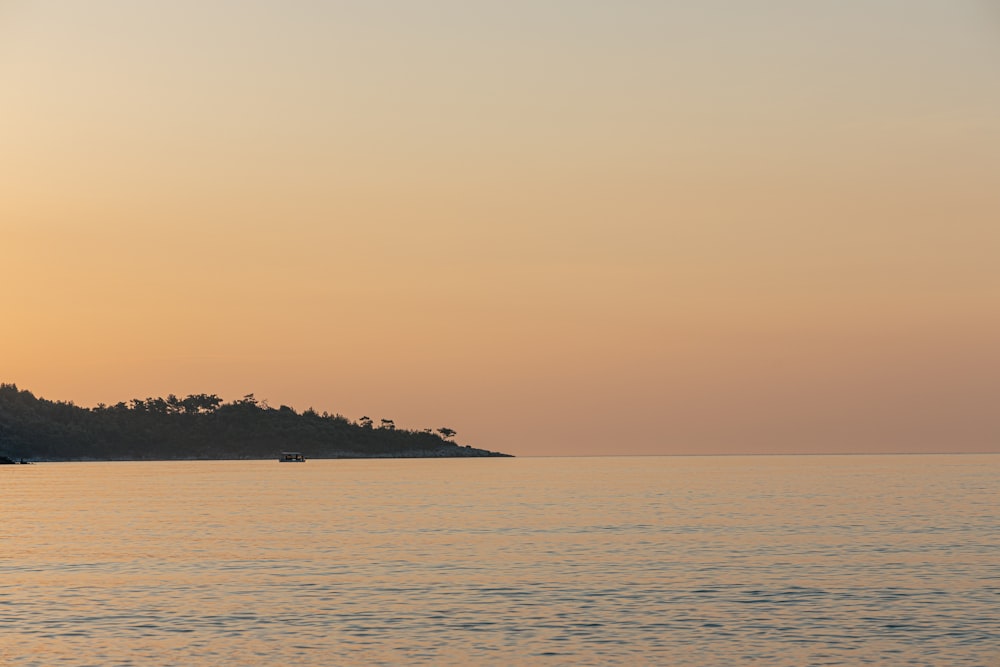 a body of water with a land in the distance