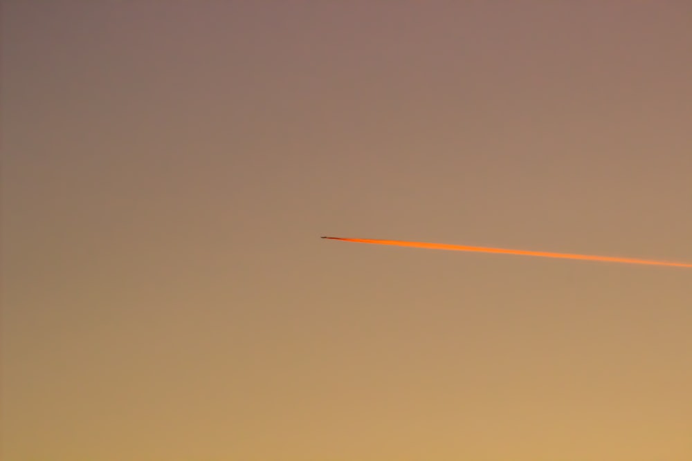 a jet flying in the sky