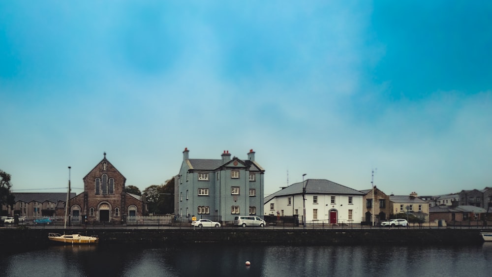 a body of water with buildings along it