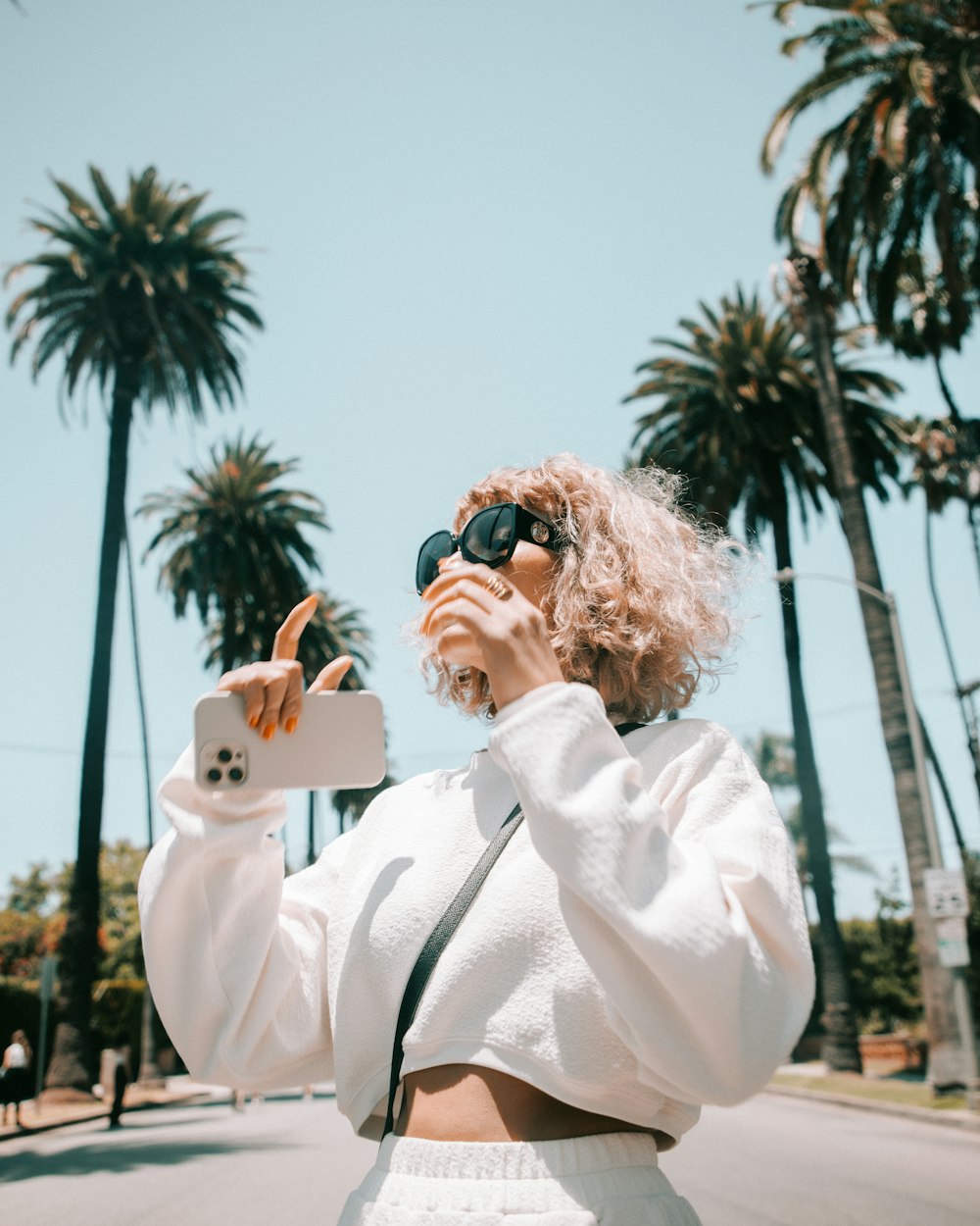 a person with a camera on the head and a box in the hand