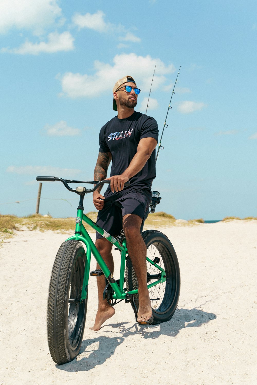 a man on a green bike