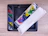 Close-up of hands unboxing a colorful mosaic product with a bright smile in the background.