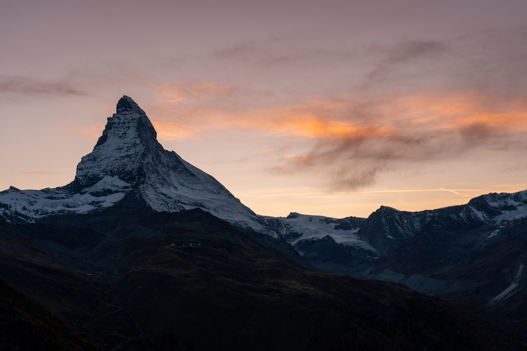 a mountain range with snow,