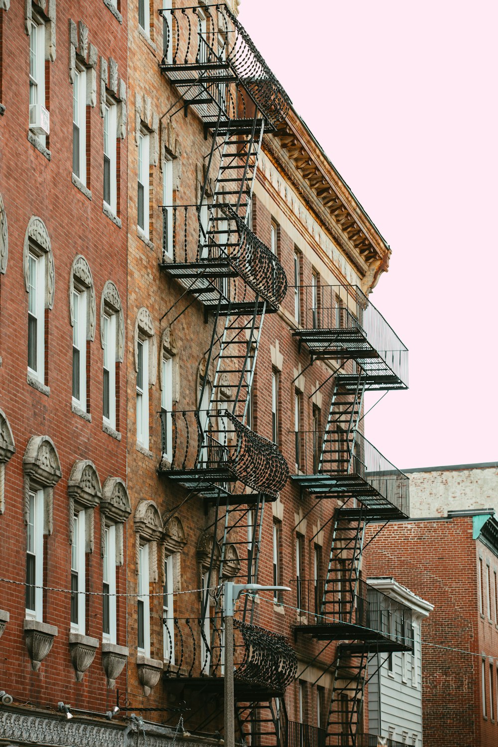 a building with balconies and a staircase