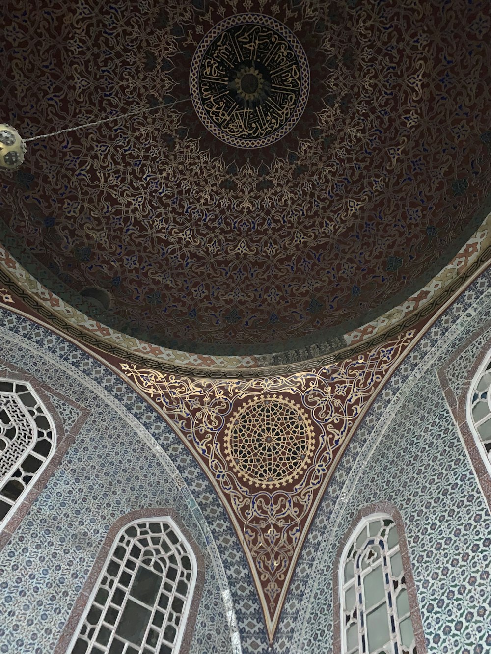 a domed ceiling with a clock