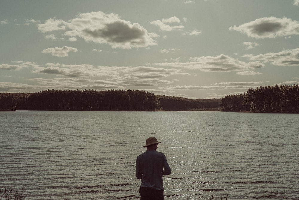 a man fishing in a lake