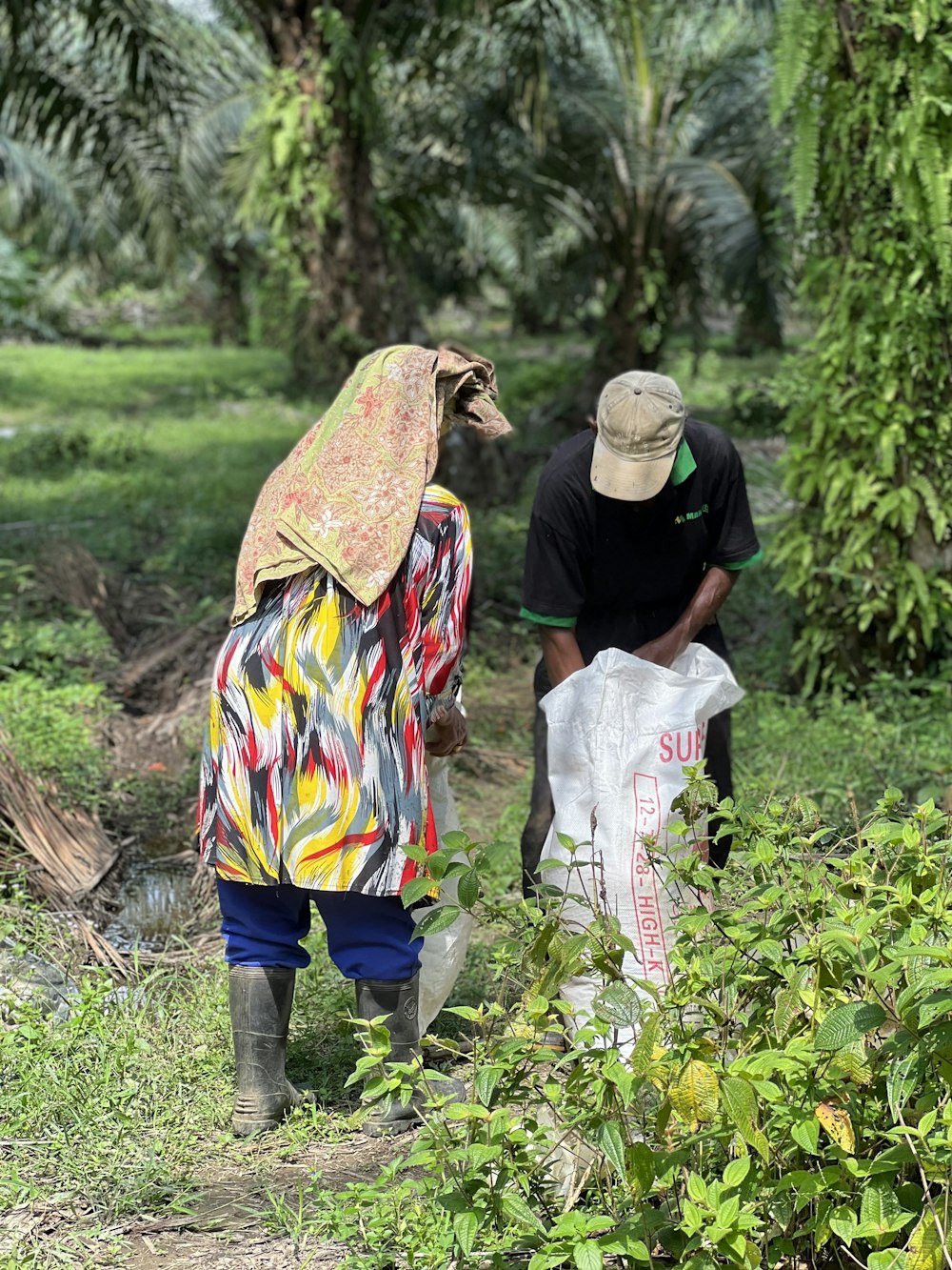 a couple of people carrying bags