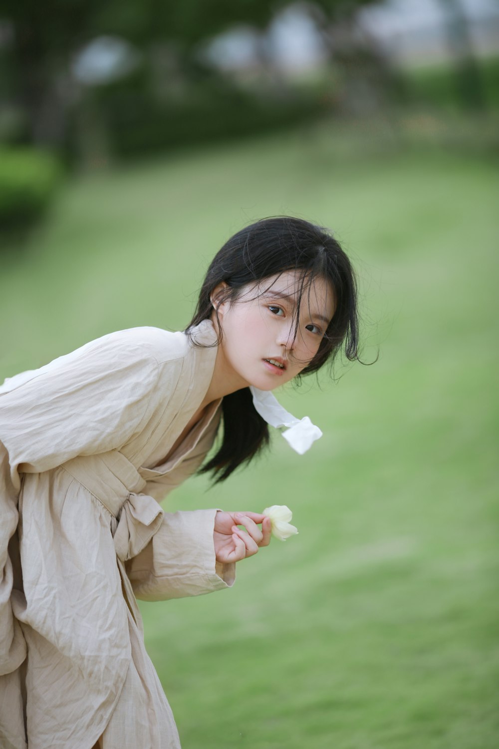 a person holding a flower