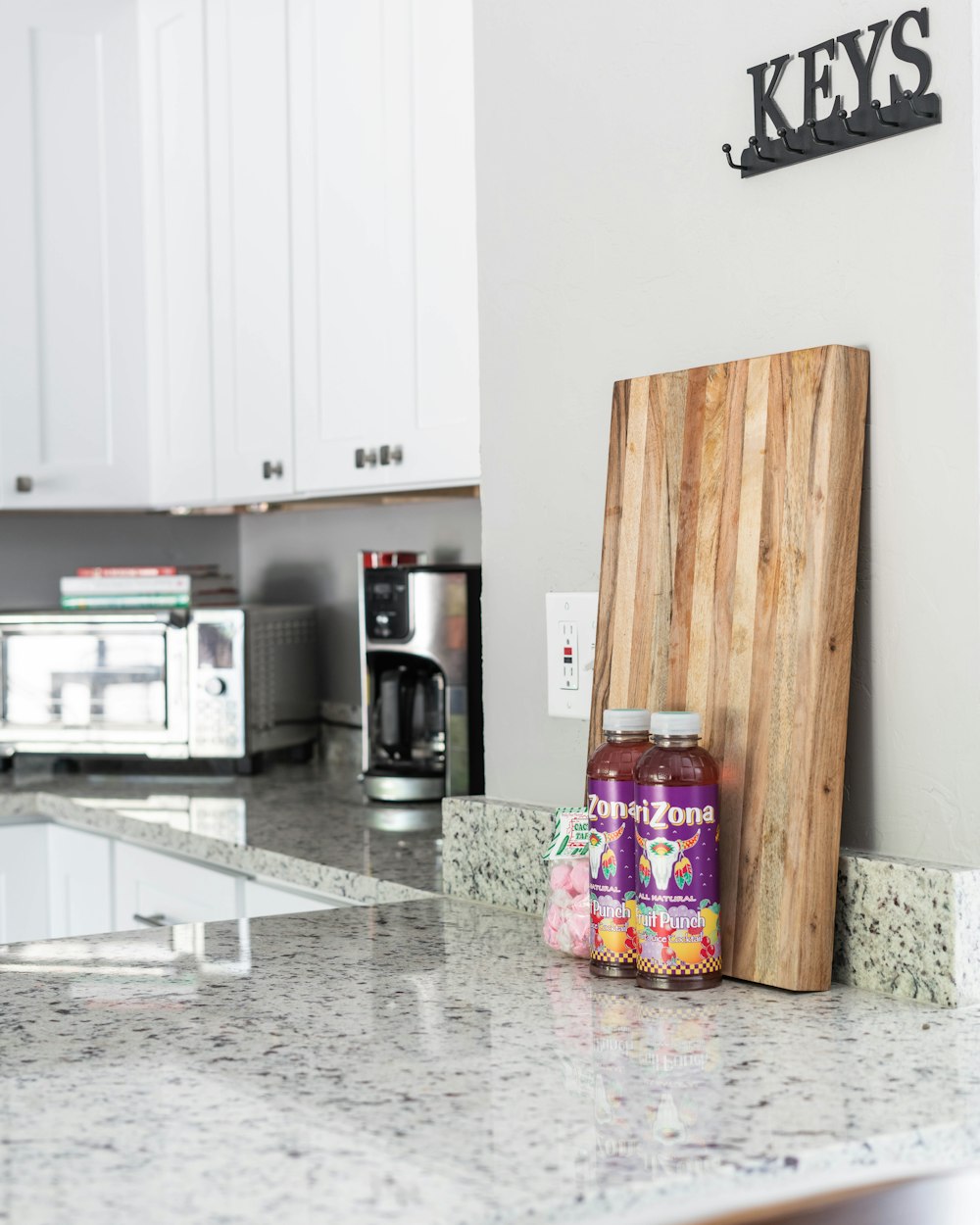 a kitchen with a wooden cabinet