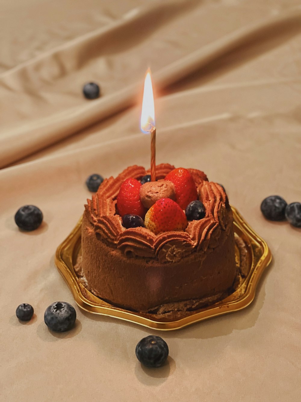 a cake with a candle on top