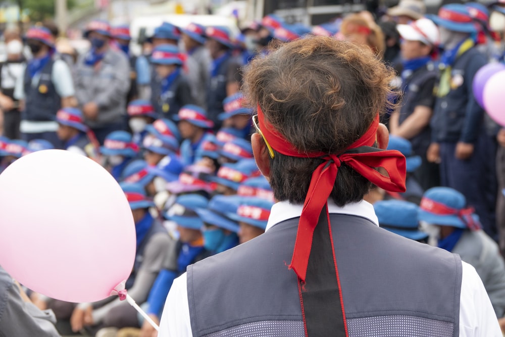 a person with a red tie