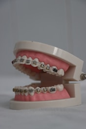 a pink cake with a white frosting and a pink frosting