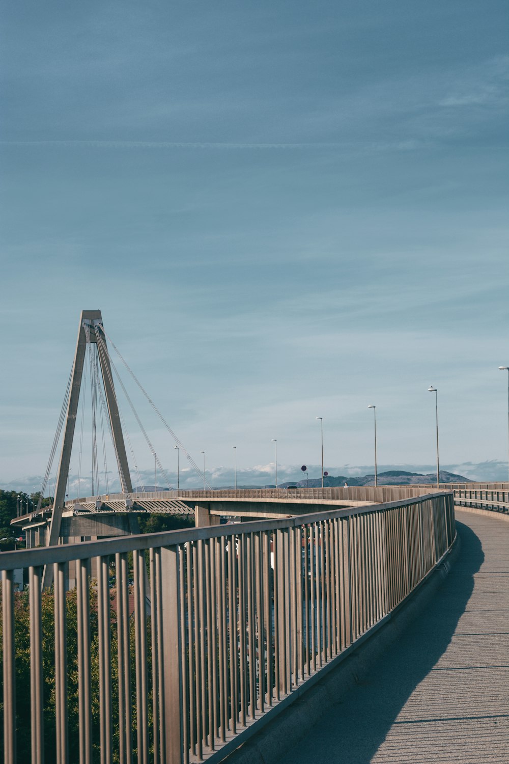 a bridge with a metal railing