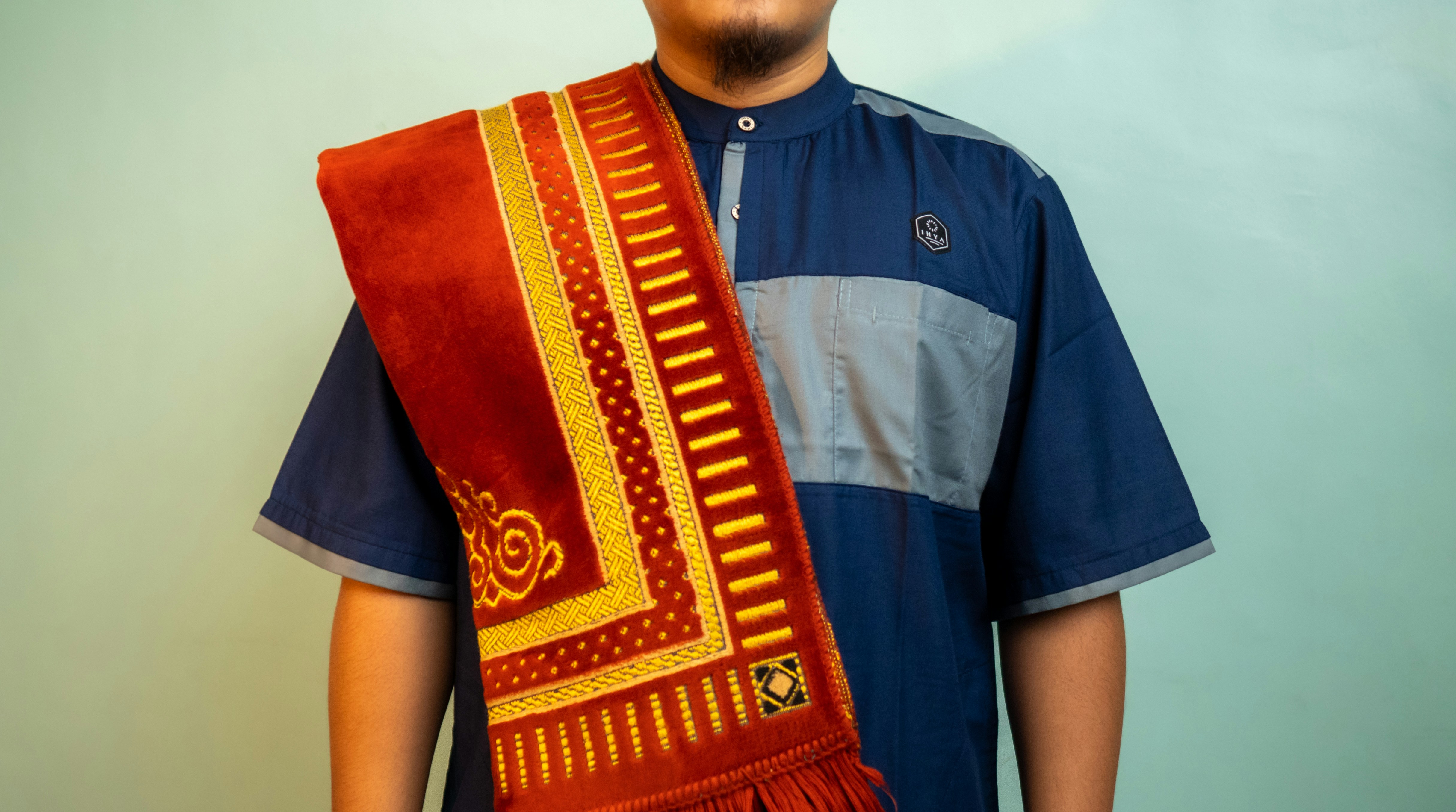 Muslim man with prayer rug