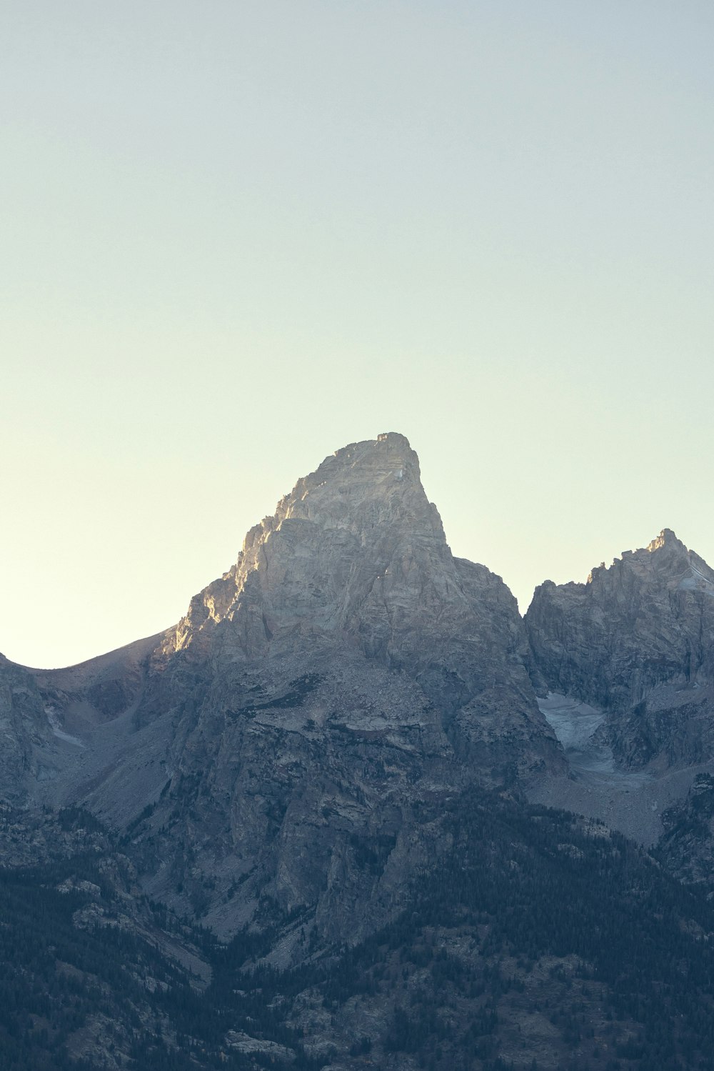 a mountain with a valley below