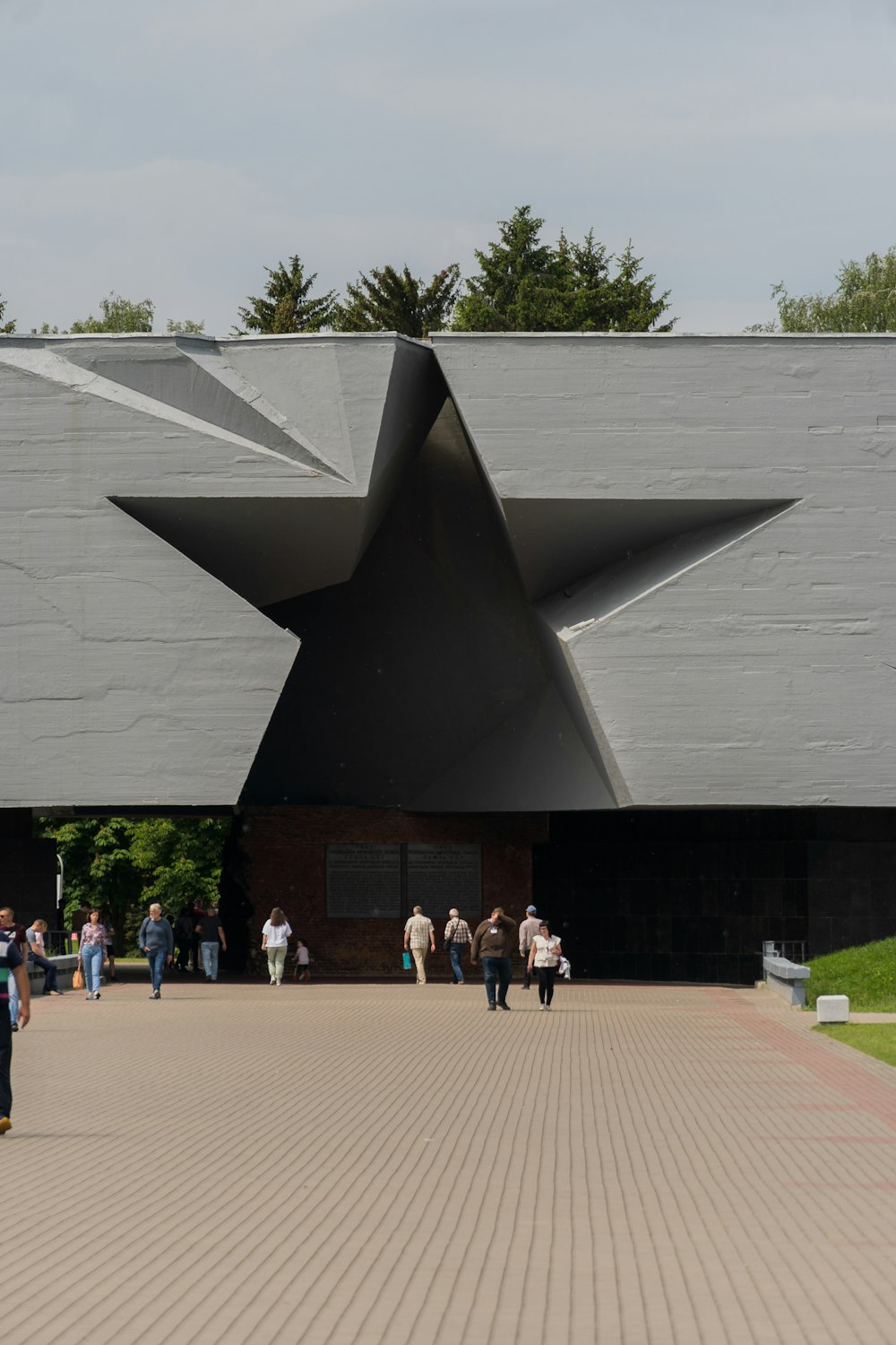 a group of people walking outside a building