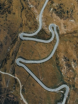 a winding road in the desert