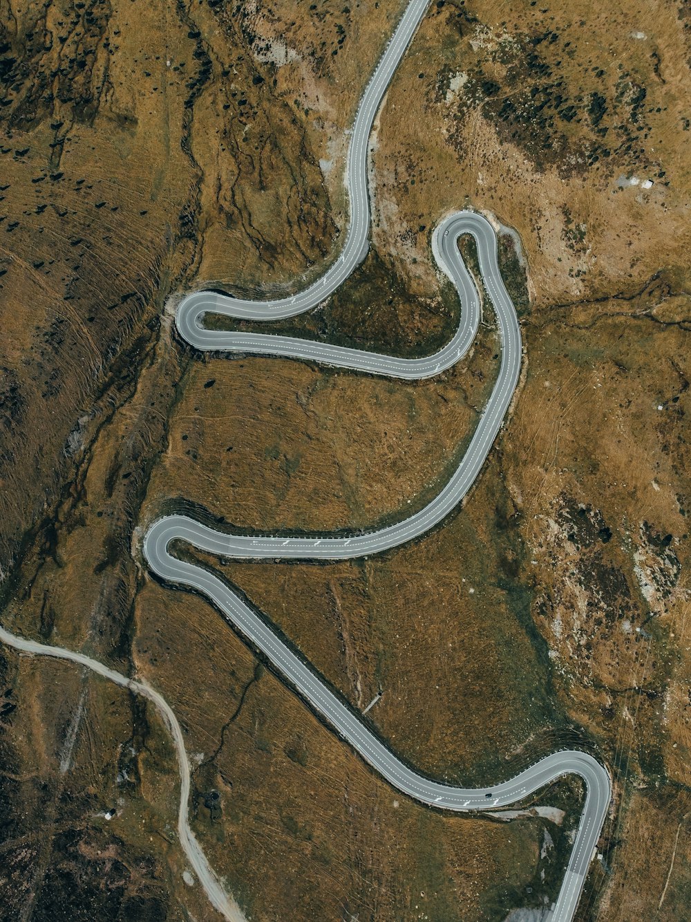 a winding road in the desert