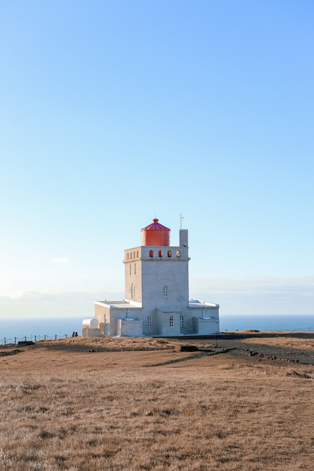 a lighthouse on a beach