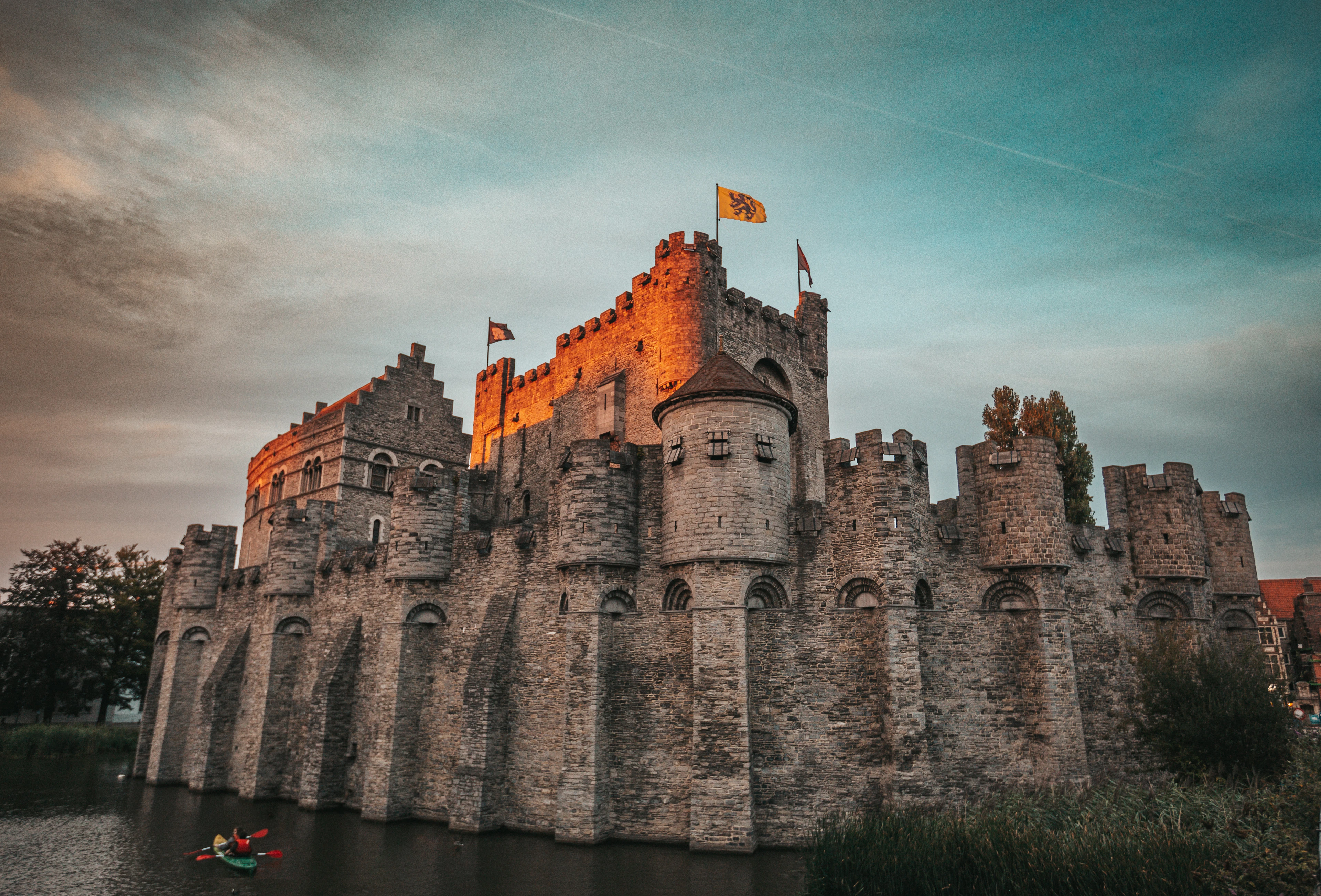 Gravensteen, the moated medieval Castle of the Counts in Ghent, at dusk