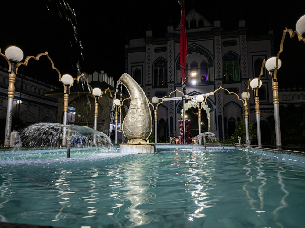 a fountain in front of a building